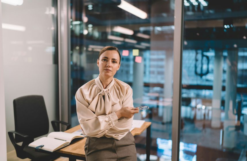 Confident businesswoman in modern workspace